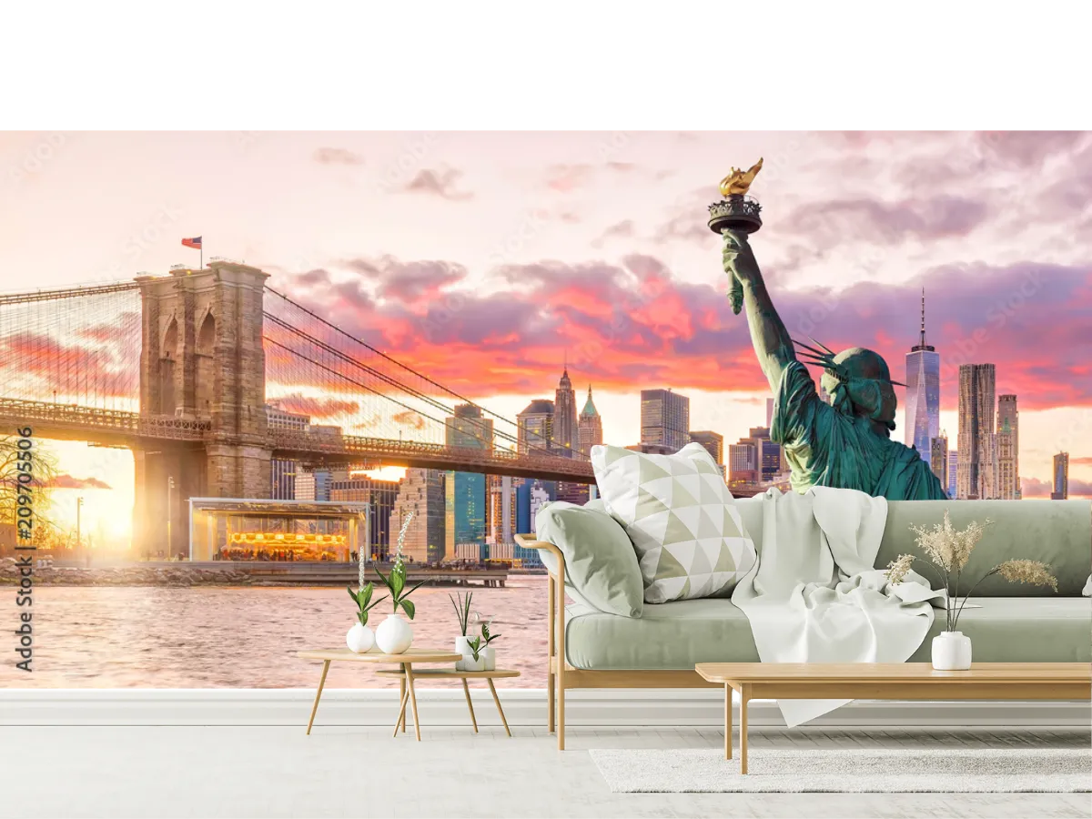 Statue Liberty and  New York city skyline at sunset